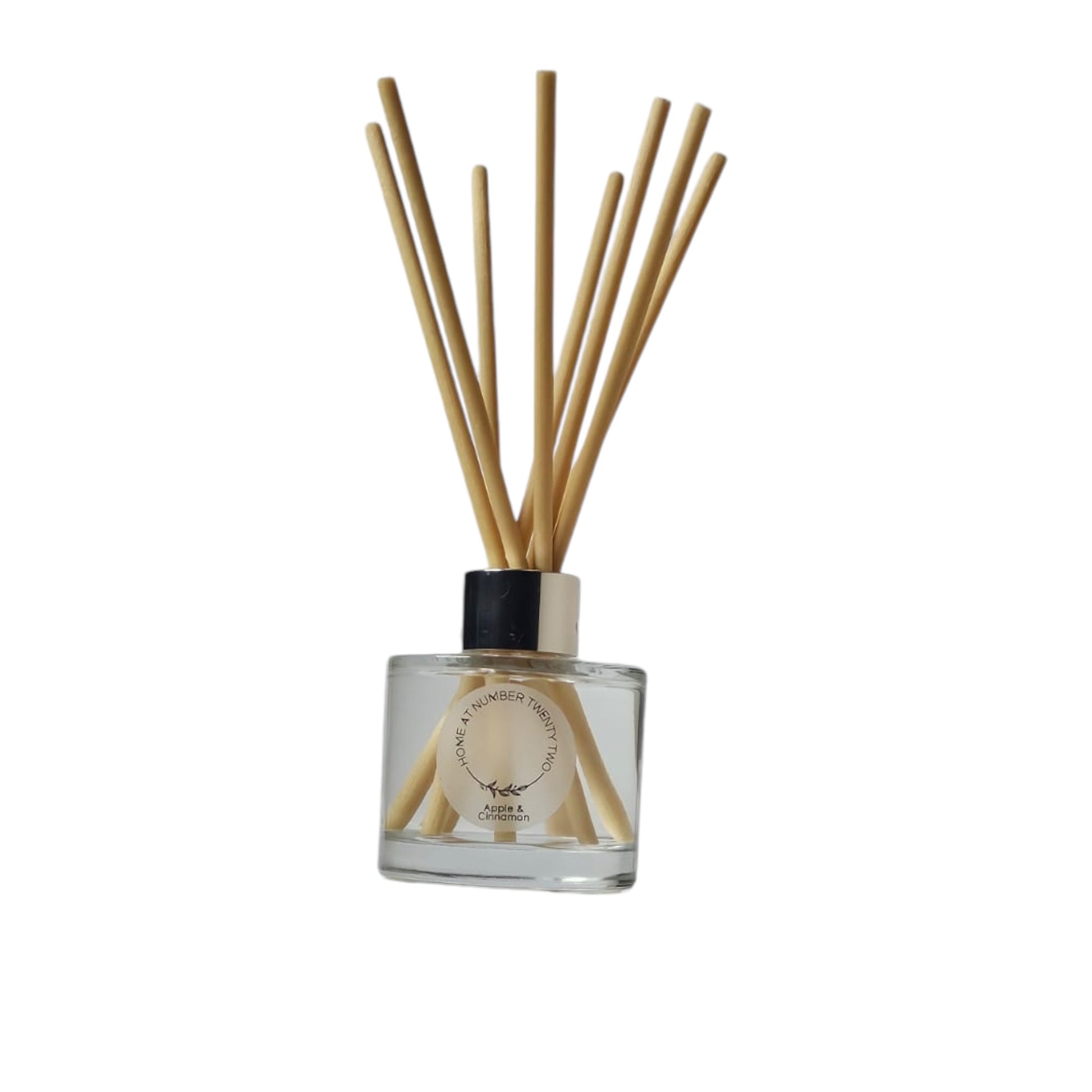 Apple and Cinnamon Reed Diffuser by Home at Number Twenty Two - a warm and inviting home fragrance with sweet apple and spicy cinnamon notes, elegantly presented with natural reeds.