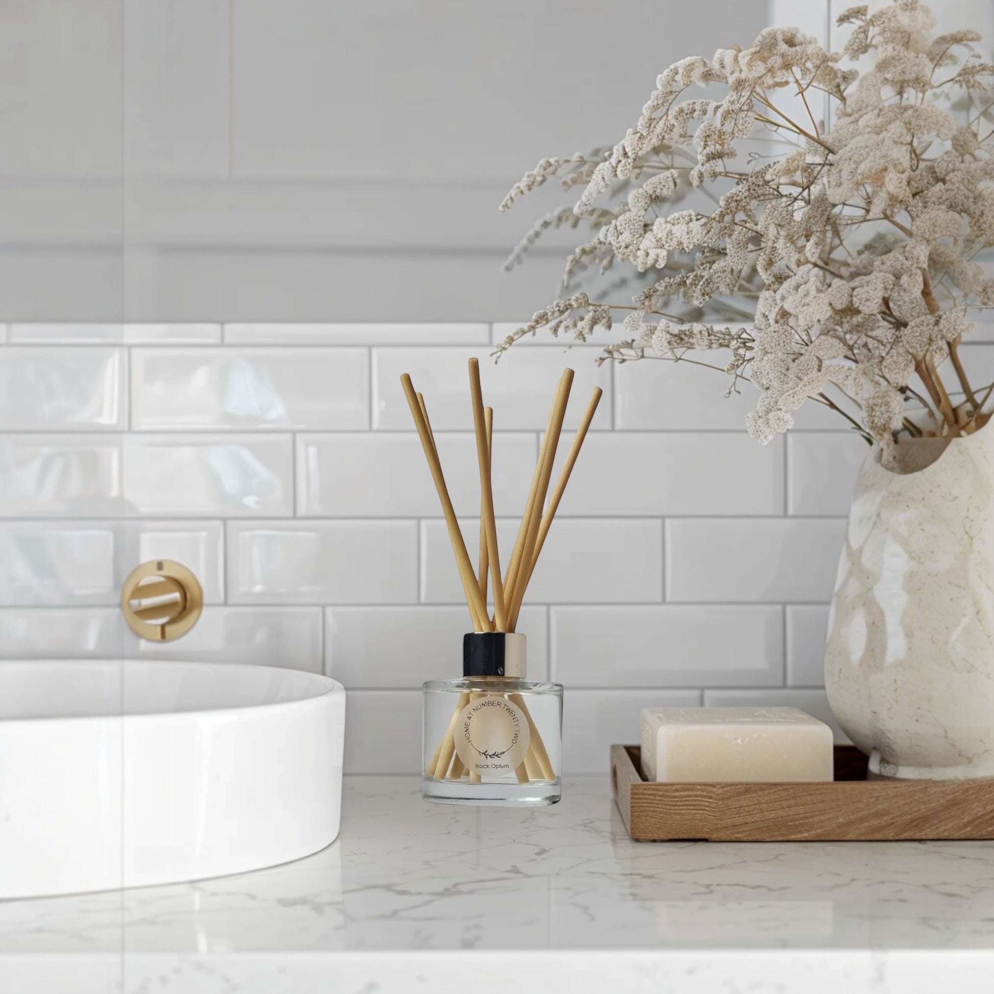 Black Opium Reed Diffuser by Home at Number Twenty Two – a luxurious and captivating home fragrance with rich coffee, vanilla, and, floral notes, elegantly presented with natural reeds.