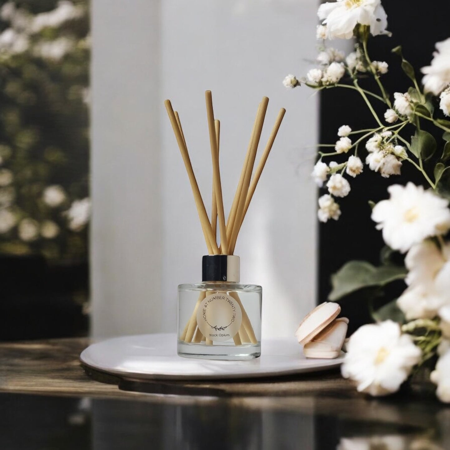 Black Opium Reed Diffuser by Home at Number Twenty Two – a luxurious and captivating home fragrance with rich coffee, vanilla, and, floral notes, elegantly presented with natural reeds.