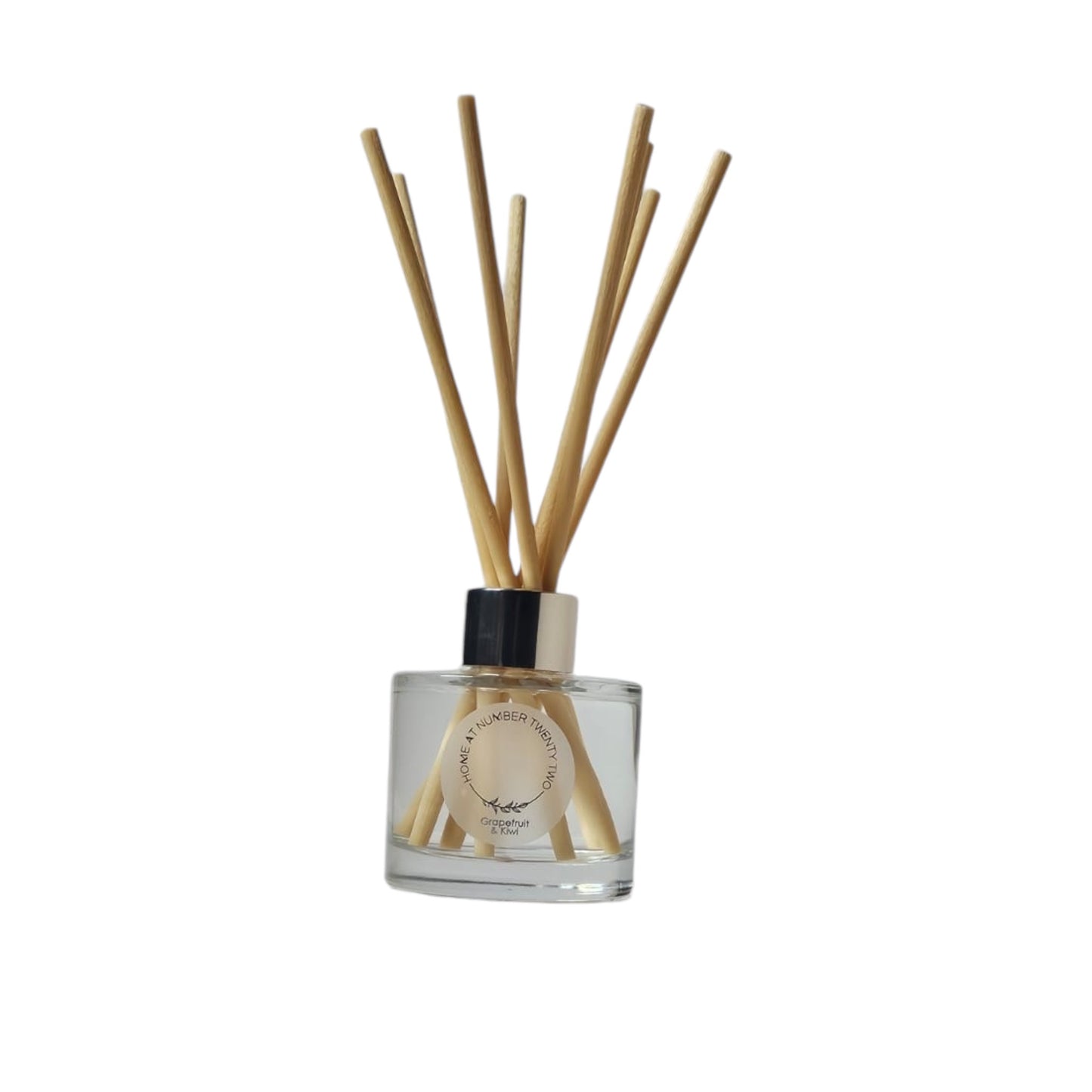 Grapefruit and Kiwi Reed Diffuser by Home at Number Twenty Two – a vibrant and refreshing home fragrance with zesty grapefruit and sweet kiwi notes, elegantly presented with natural reeds.