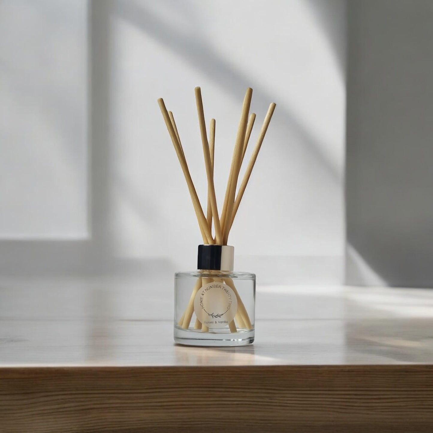 Honey and Vanilla Reed Diffuser by Home at Number Twenty Two – a warm and comforting home fragrance with rich honey and creamy vanilla notes, elegantly presented with natural reeds.