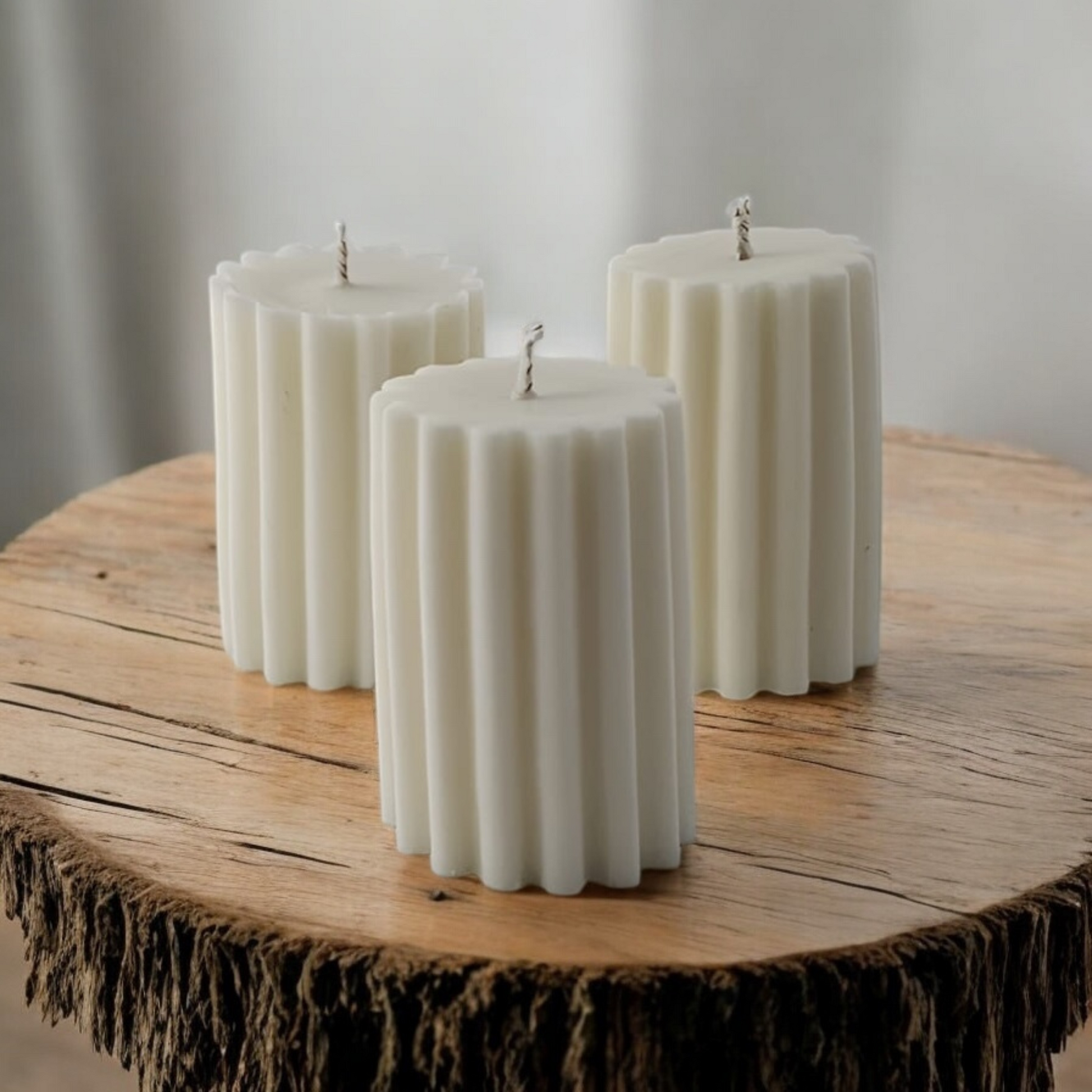 Ribbed Pillar Candle by Home at Number Twenty Two – a stylish and elegant handcrafted candle with a unique ribbed design, perfect for adding a warm and decorative touch to any space.