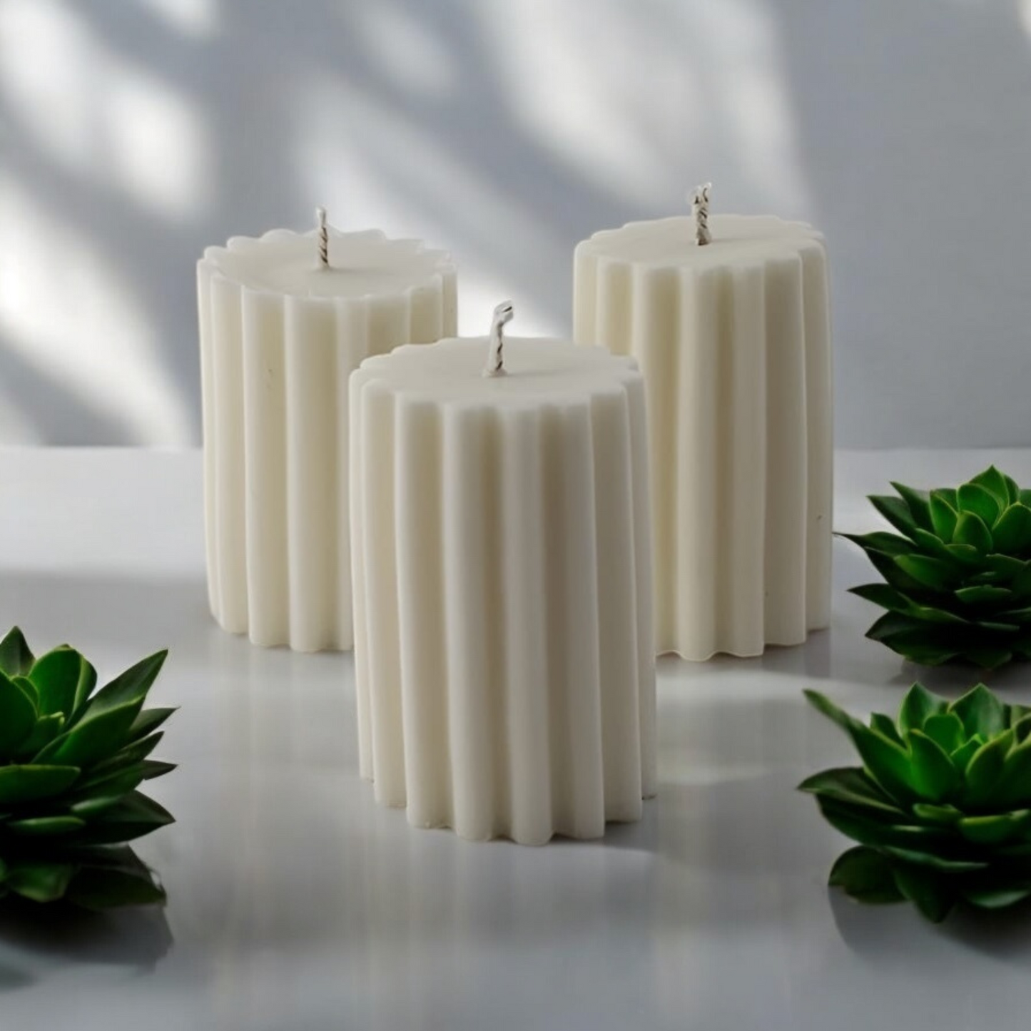 Ribbed Pillar Candle by Home at Number Twenty Two – a stylish and elegant handcrafted candle with a unique ribbed design, perfect for adding a warm and decorative touch to any space.
