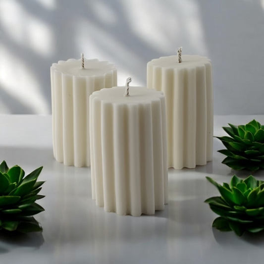 Ribbed Pillar Candle by Home at Number Twenty Two – a stylish and elegant handcrafted candle with a unique ribbed design, perfect for adding a warm and decorative touch to any space.