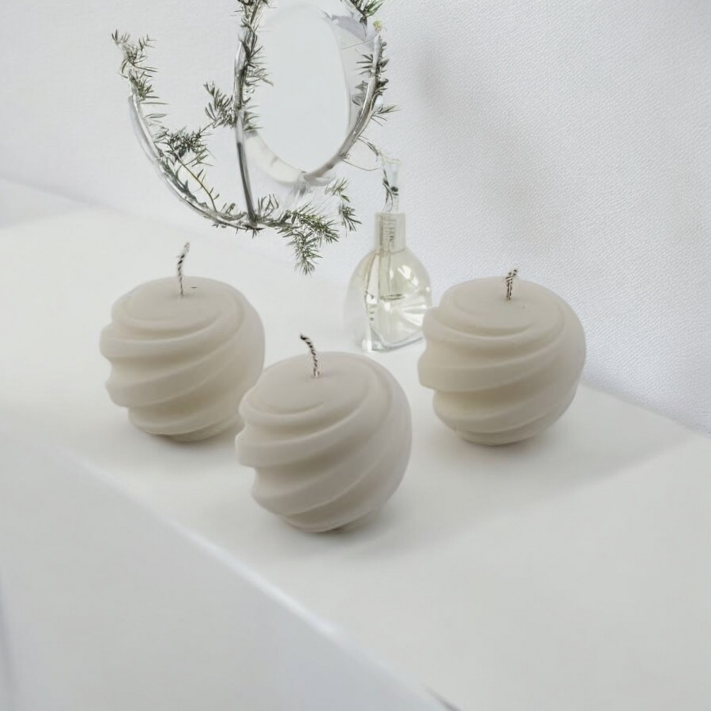 Twirl Orb Candles by Home at Number Twenty Two – elegantly handcrafted spherical candles with a delicate twirl design, perfect for adding a warm and decorative touch to any space.