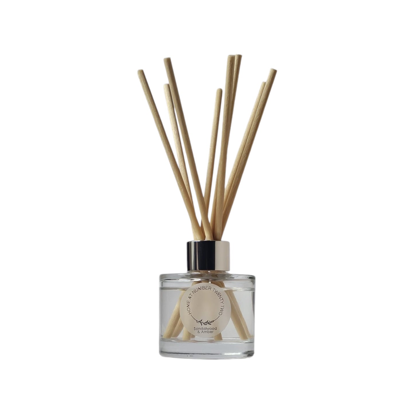 Sandalwood and Amber Reed Diffuser by Home at Number Twenty Two – a warm and luxurious home fragrance with rich sandalwood, golden amber, and subtle vanilla notes, elegantly presented with natural reeds.