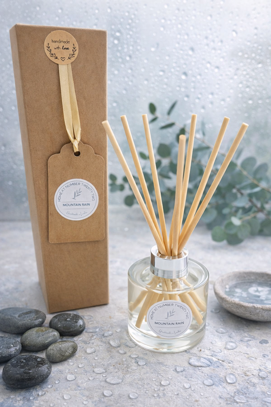 Handmade Mountain Rain Reed Diffuser with kraft gift box, luxury home fragrance inspired by fresh rain, woodland and pine, handcrafted in London.
