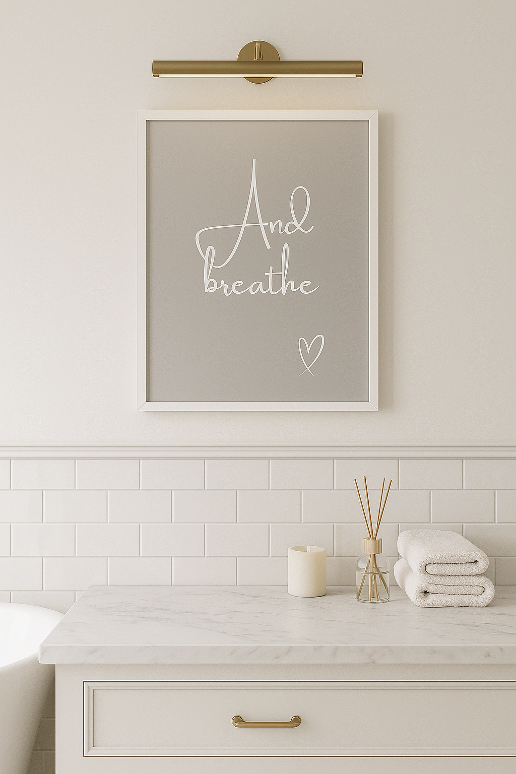 And Breathe Calm Wall Art light grey background and white calligraphy style font with hand-drawn style heart, set in a neutral, styled bathroom setting