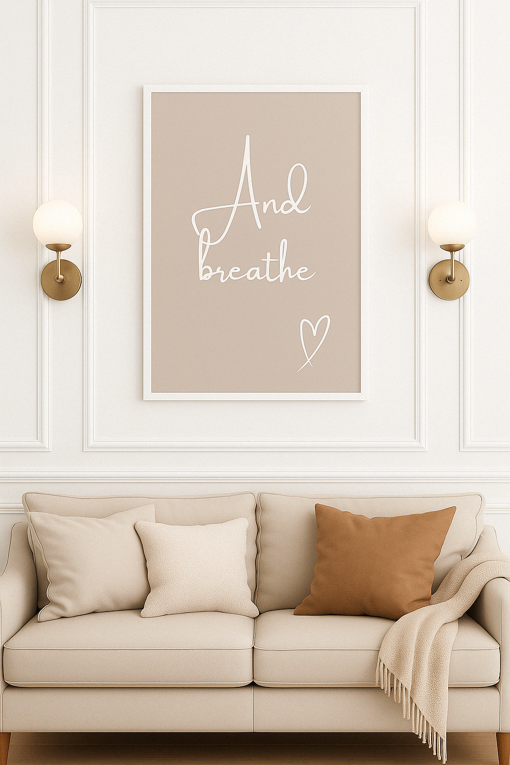 And Breathe Calm Wall Art with a taupe background and white calligraphy style font with hand-drawn style heart, set in a neutral, styled living room