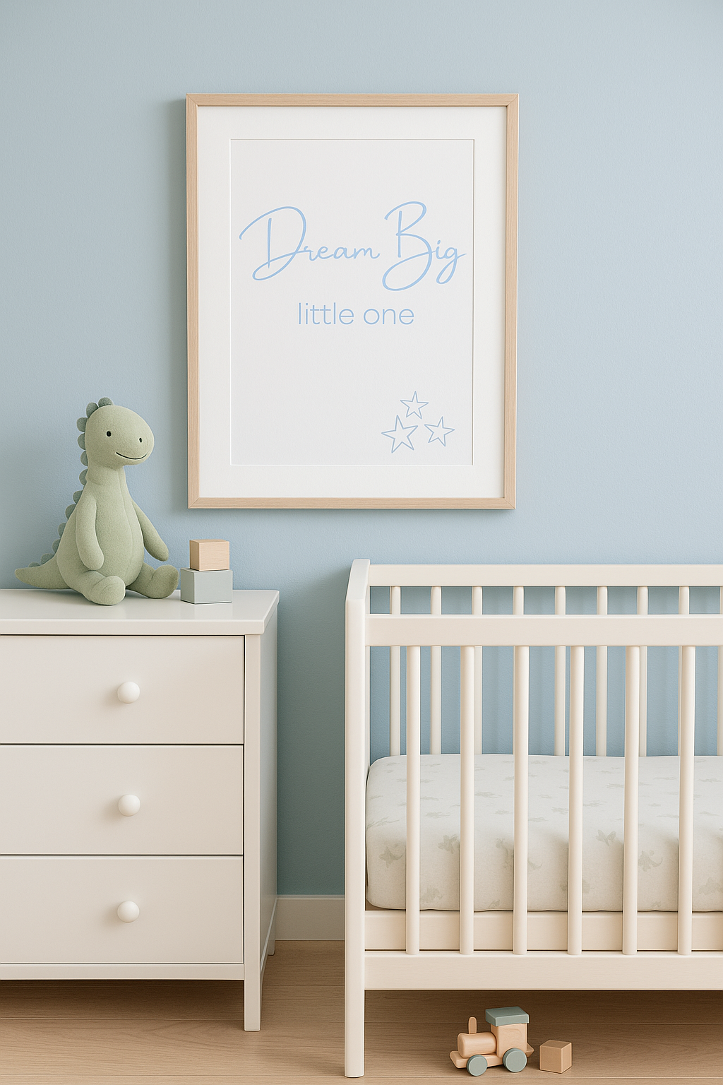 Dream Big Little One Pastel Blue Wall Art shown in nursery