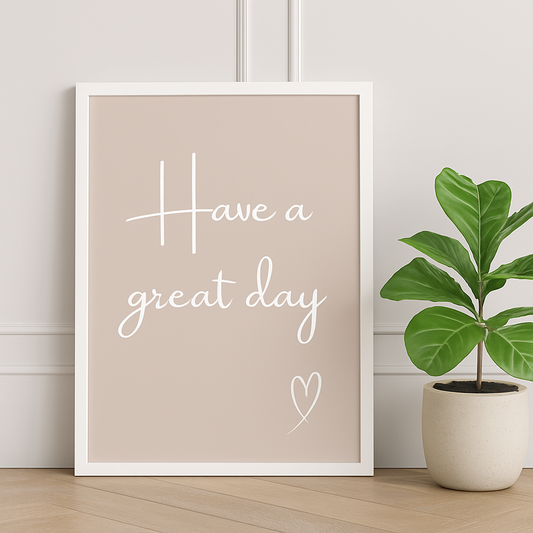 Have a Great Day wall art typography print in white calligraphy style font on a taupe background and hand drawn style heart, shown in frame in a minimal interior setting