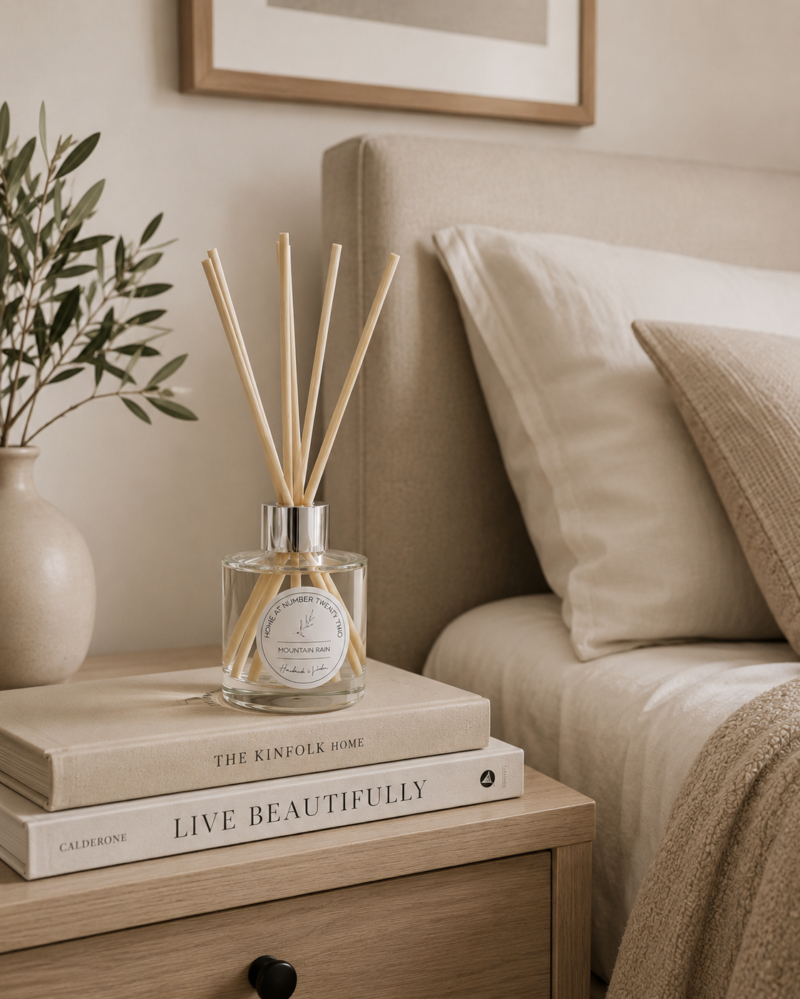 Mountain Rain Reed Diffuser on a bedside table in a Scandinavian bedroom, adding a fresh, relaxing fragrance inspired by nature.