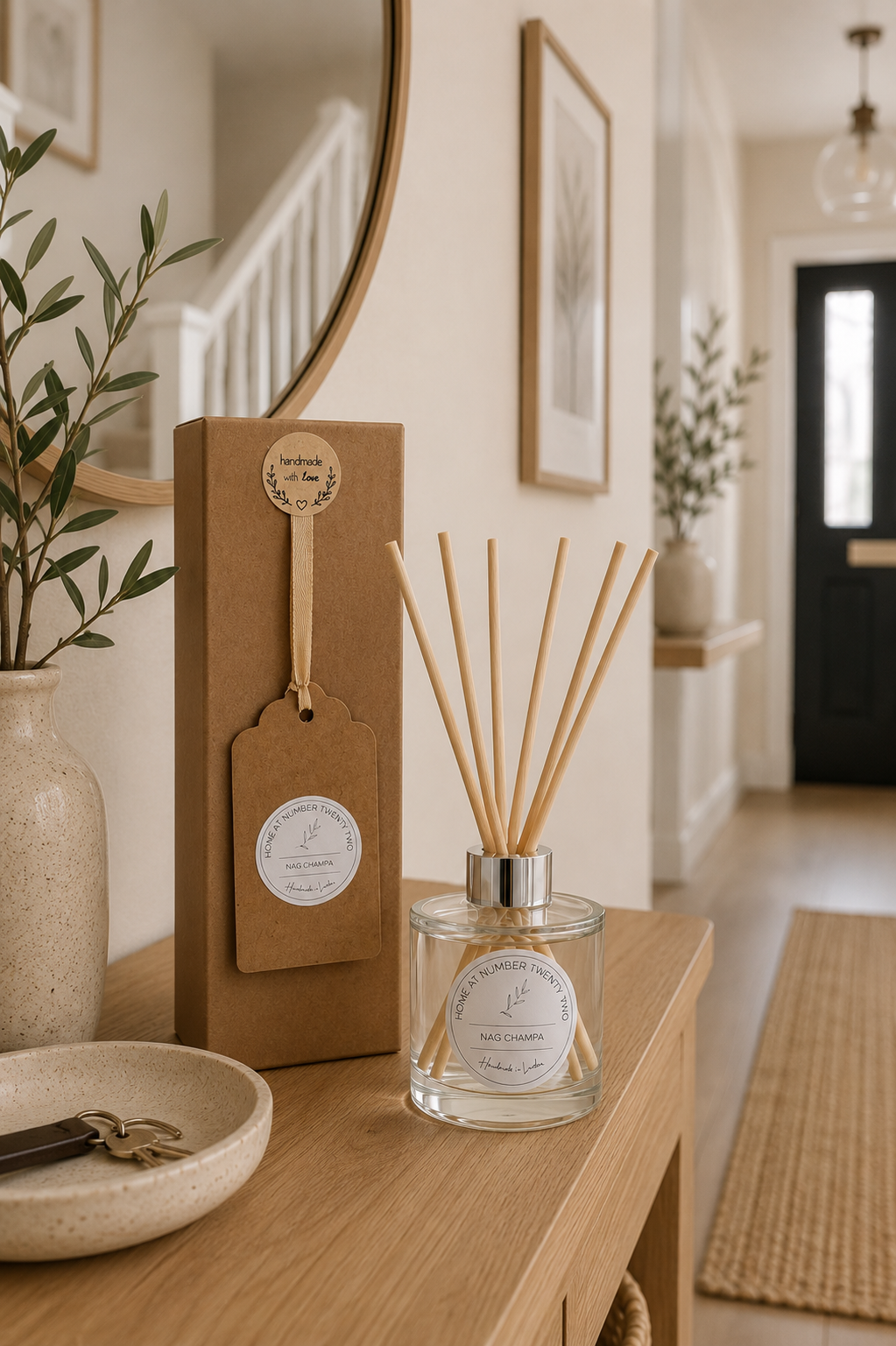 Handmade Nag Champa Reed Diffuser with gift box styled on a Scandi hallway table, elegant home fragrance for modern interiors.