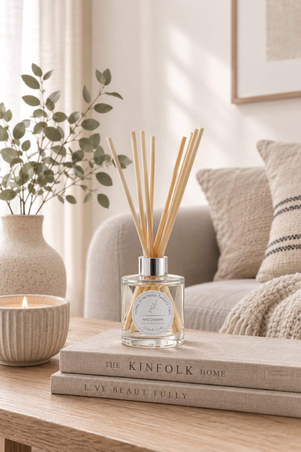 Luxury Nag Champa Reed Diffuser displayed in a modern living room with neutral décor, handmade home fragrance inspired by traditional incense