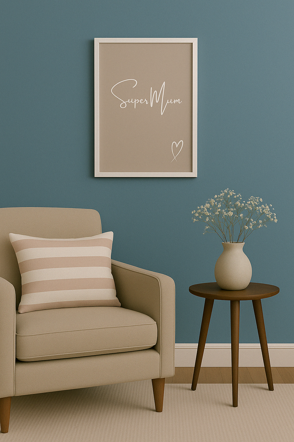 Beige armchair with striped pillow, wooden side table with vase, and framed artwork saying ''Super Mum'' on blue wall.
