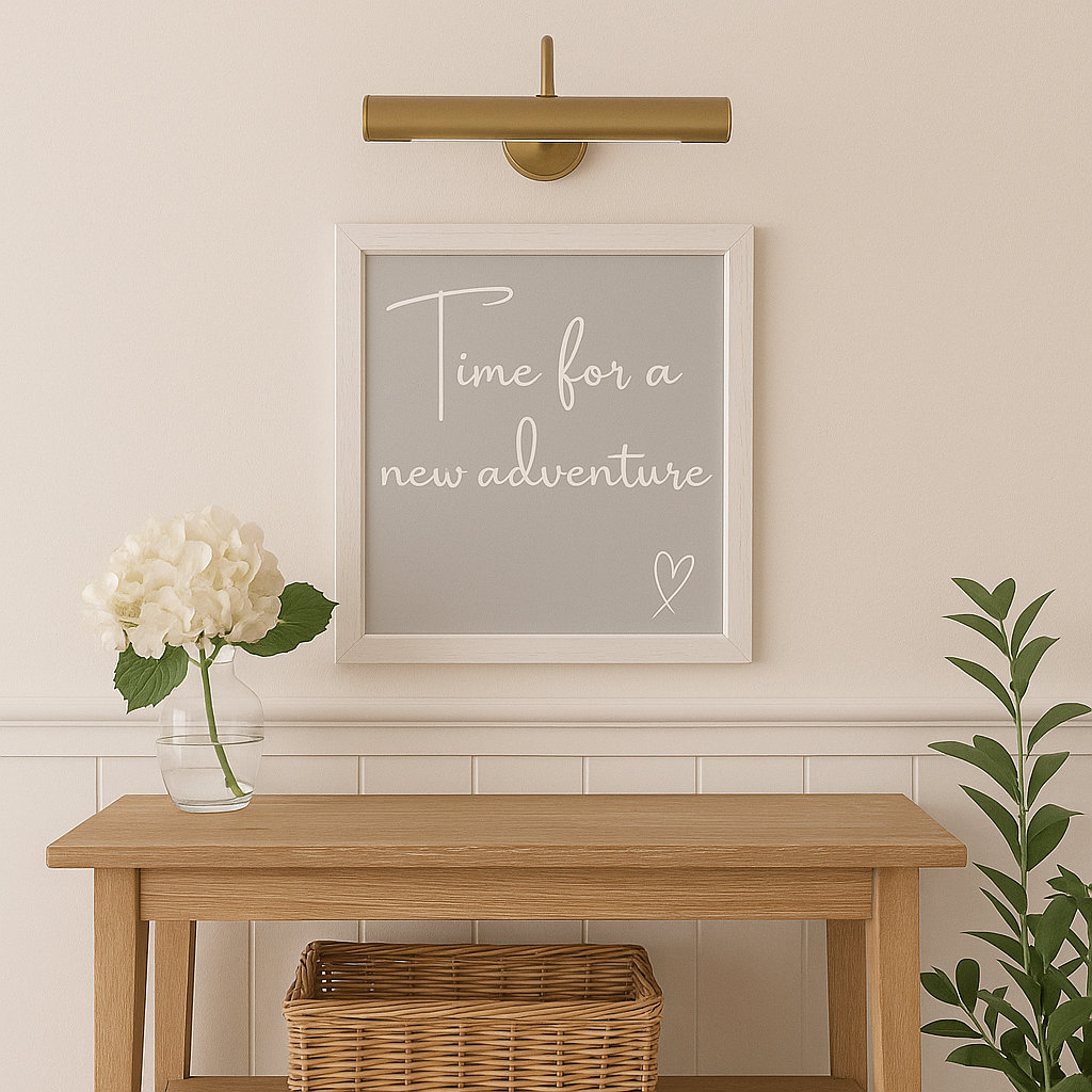 Decorative wall art ''Time for a New Adventure'' with motivational quote on a light wooden table and wall.